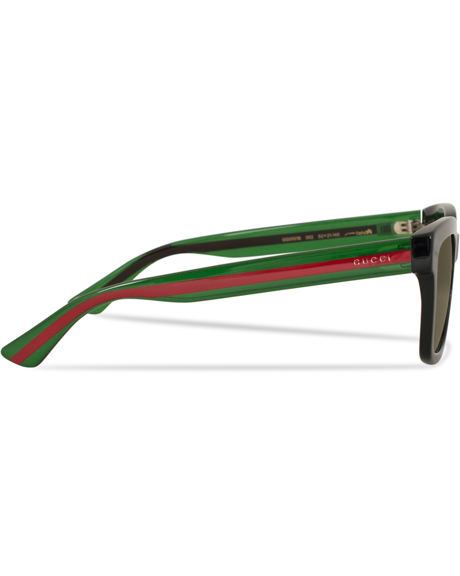 Homme | Gucci GG0001S Sunglasses Black/Green | Gucci | GG0001S Sunglasses Black/Green