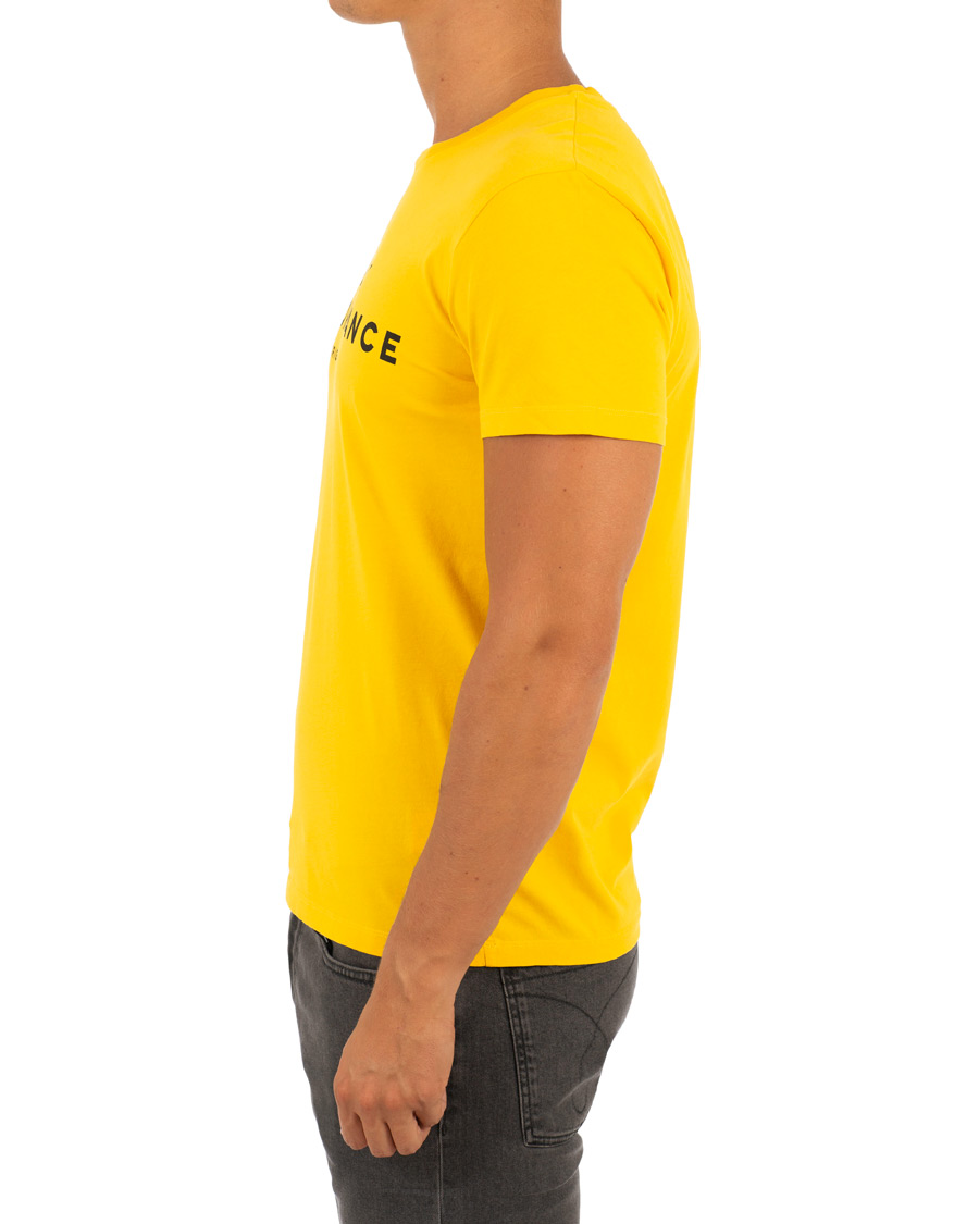 Homme | T-shirts | Peak Performance | Logo Crew Neck Tee Dessert Yellow