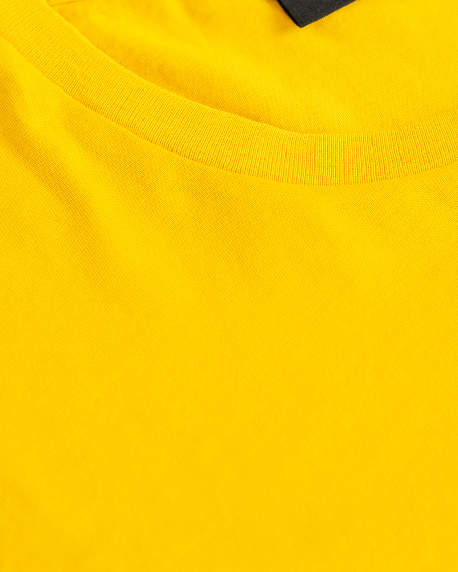 Homme | T-shirts | Peak Performance | Logo Crew Neck Tee Dessert Yellow