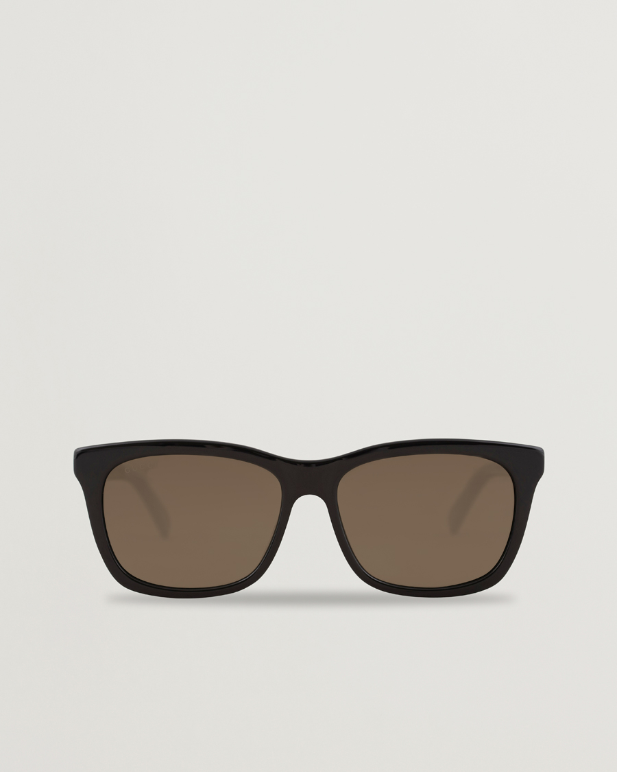 Homme | Gucci GG0449S Sunglasses Black/Gold/Brown | Gucci | GG0449S Sunglasses Black/Gold/Brown