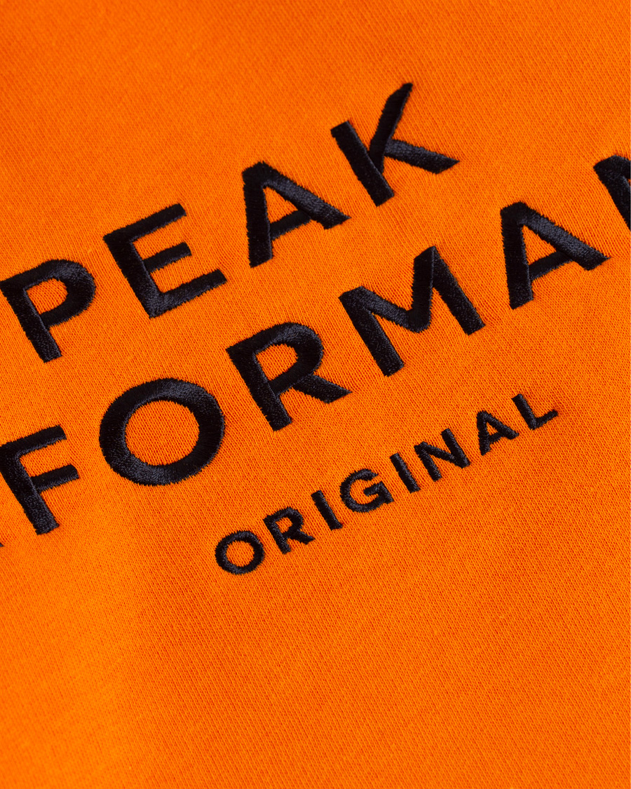 Heren | Truien | Peak Performance | Logo Hoodie Orange