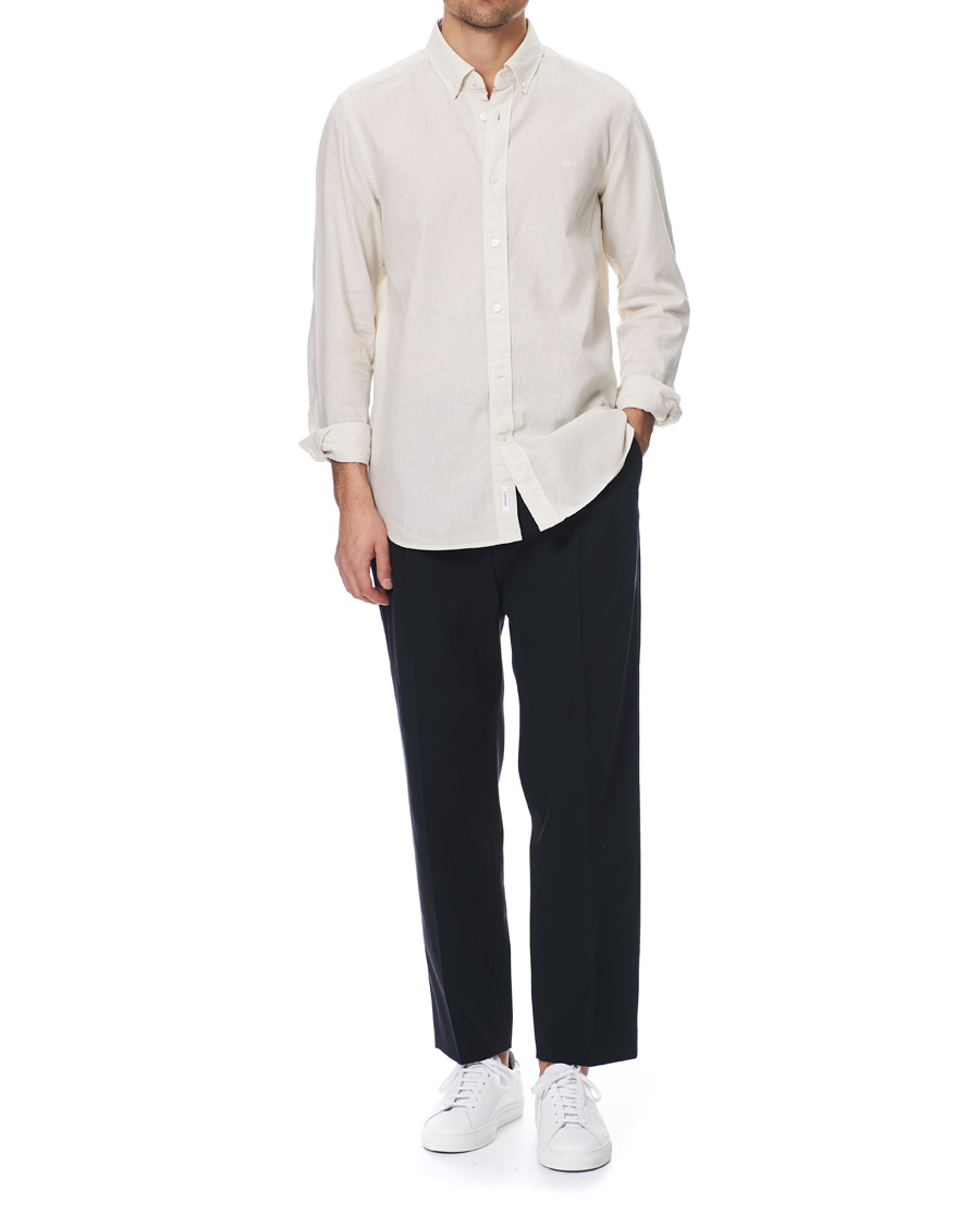Homme | Pantalons | Filippa K | Samson Loose Fit Pleated Cotton Trousers Navy