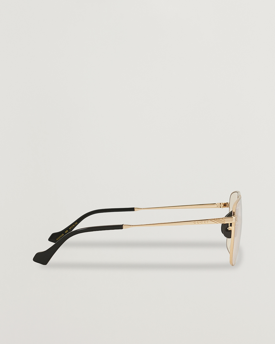 Homme | Gucci GG0743S Photochromic Sunglasses Shiny Endura Gold | Gucci | GG0743S Photochromic Sunglasses Shiny Endura Gold