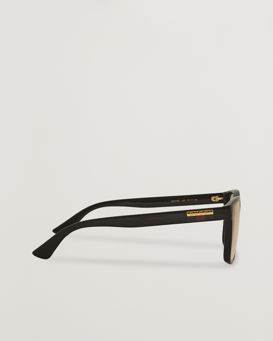 Homme | Gucci GG0746S Photochromic Sunglasses Shiny Black | Gucci | GG0746S Photochromic Sunglasses Shiny Black