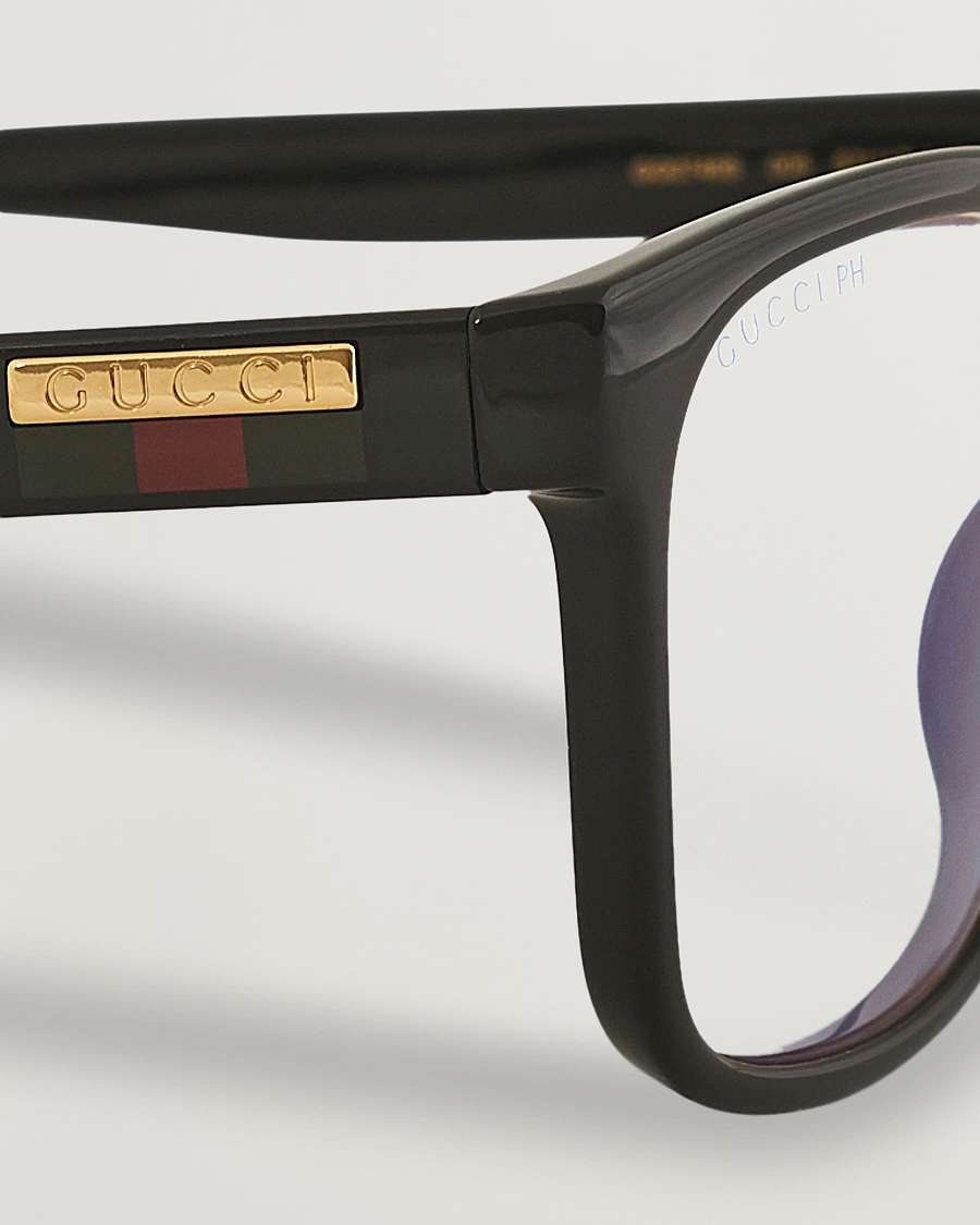 Homme | Gucci GG0746S Photochromic Sunglasses Shiny Black | Gucci | GG0746S Photochromic Sunglasses Shiny Black