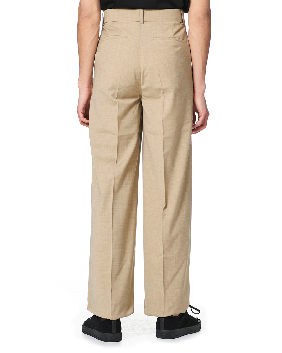 Homme | Pantalons | Nanushka | Pleated Wool Trousers Sand
