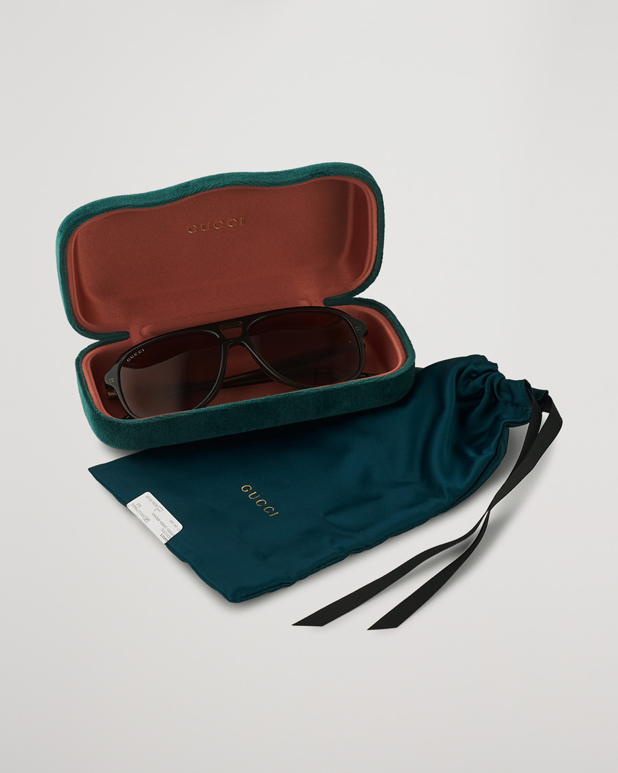 Homme | Gucci GG1156S Sunglasses Green/Brown | Gucci | GG1156S Sunglasses Green/Brown