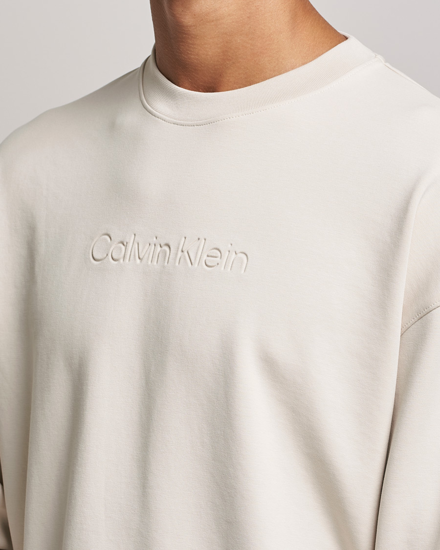 Homme | Pulls Et Tricots | Calvin Klein | Debossed Logo Crew Neck Sweatshirt Stony Beige