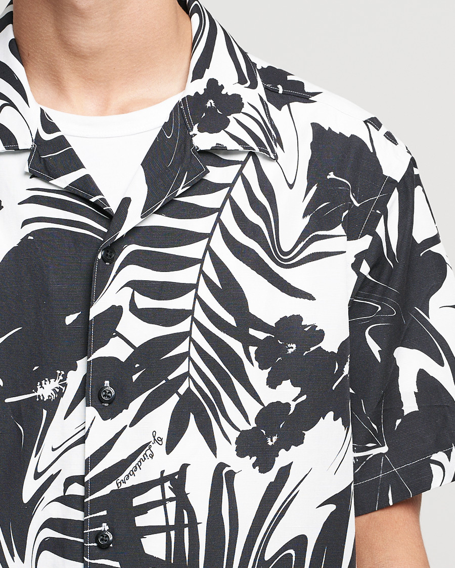 Homme | Chemises | J.Lindeberg | Elio Hibiscus Print Short Sleeve Shirt White/Black