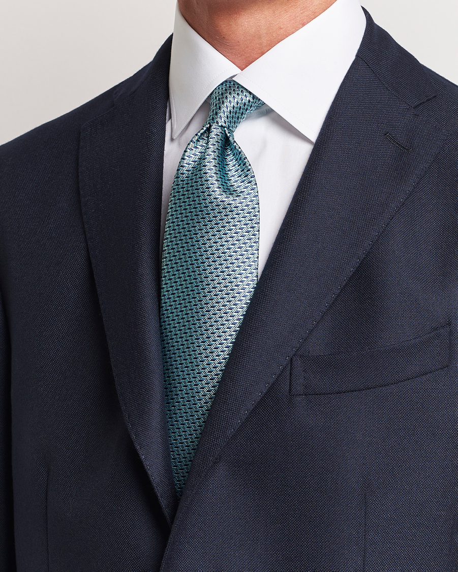 Homme | Brioni Geometrical Jacquard Silk Tie Teal | Brioni | Geometrical Jacquard Silk Tie Teal