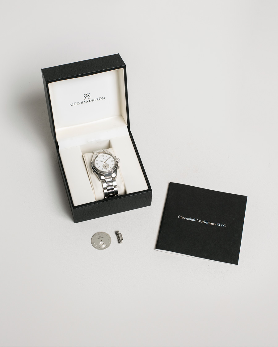 Heren | Sjöö Sandström Pre-Owned Chronolink Worldtimer WT 6202 Steel White | Sjöö Sandström Pre-Owned | Chronolink Worldtimer WT 6202 Steel White