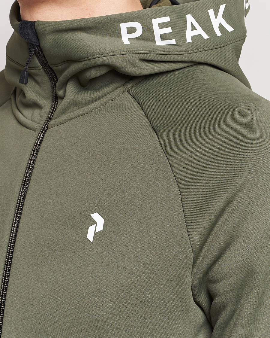 Heren | Truien | Peak Performance | Rider Hooded Full Zip Pine Needle
