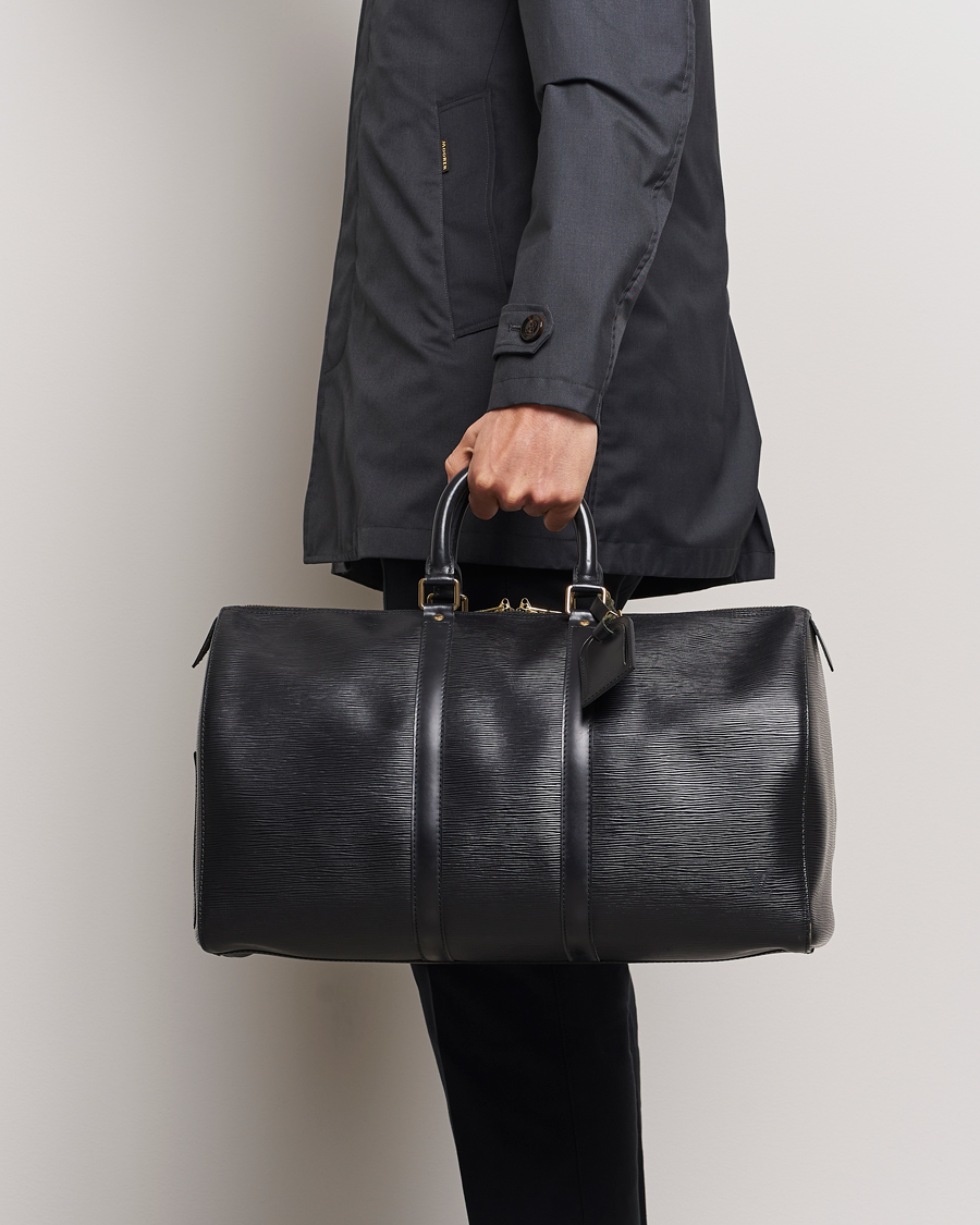 Homme | Louis Vuitton Pre-Owned Keepall 50 Epi Leather Travel Bag Black | Louis Vuitton Pre-Owned | Keepall 50 Epi Leather Travel Bag Black