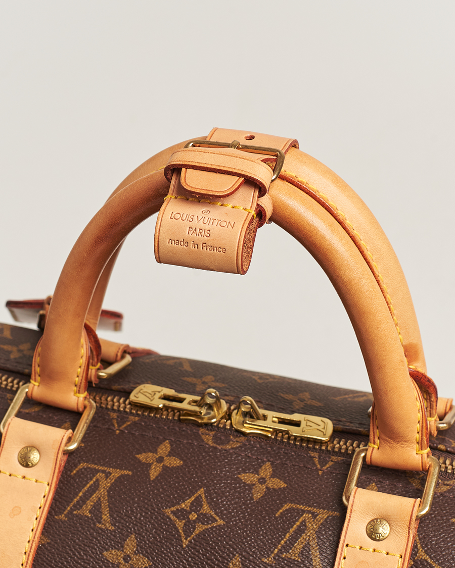Homme | Louis Vuitton Pre-Owned Keepall 50 Bag Monogram | Louis Vuitton Pre-Owned | Keepall 50 Bag Monogram