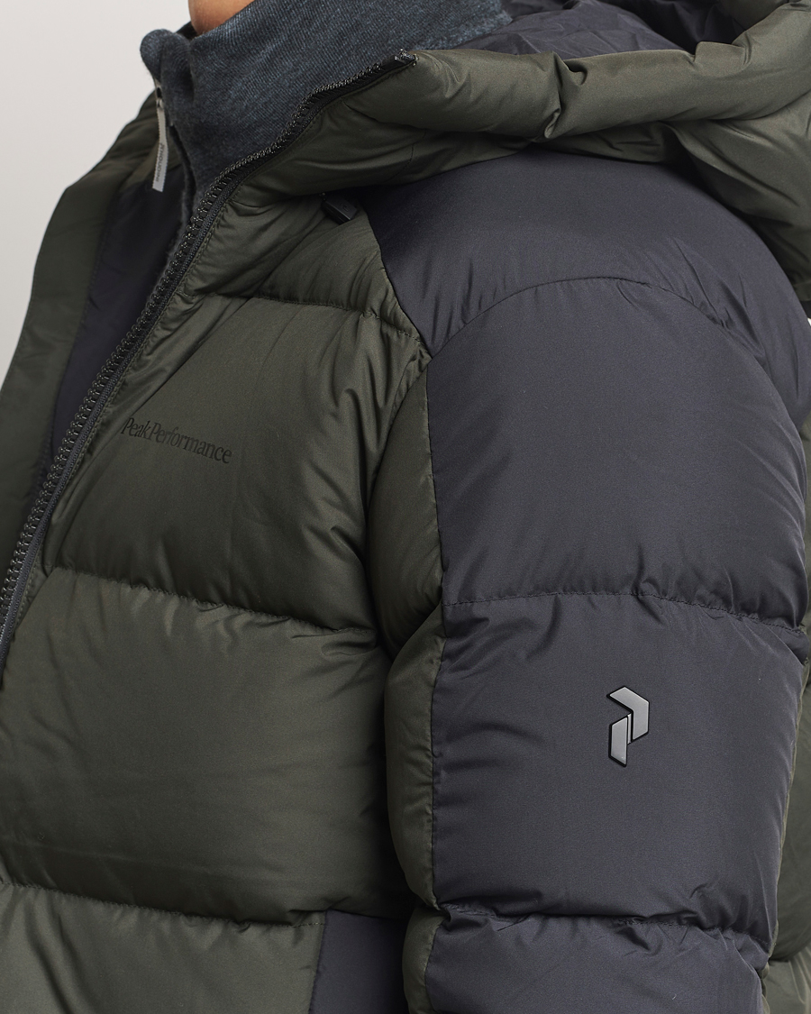 Heren | Jassen | Peak Performance | Down Puffer Hood Jacket Olive Extreme