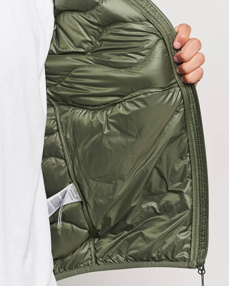 Heren | Jassen | Peak Performance | Helium Down Hooded Jacket Pine Needle