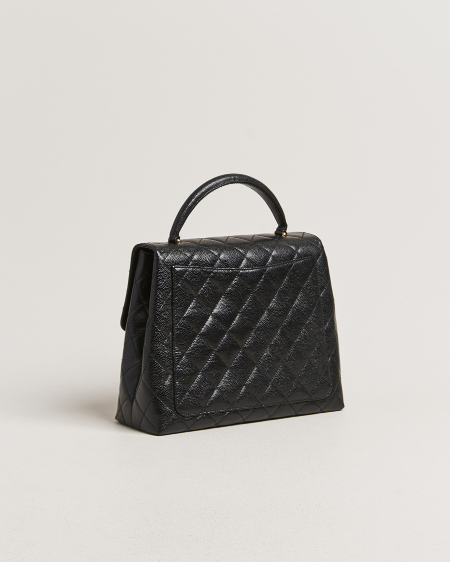 Homme | Gifts for Her | Chanel Pre-Owned | Kelly Top Handle Bag Black Caviar