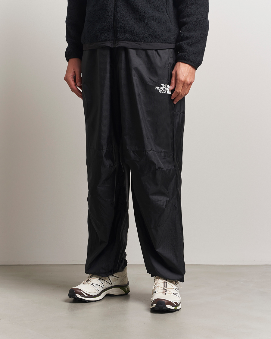 Homme | Pantalons | The North Face | NSE Wind Track Pants Black