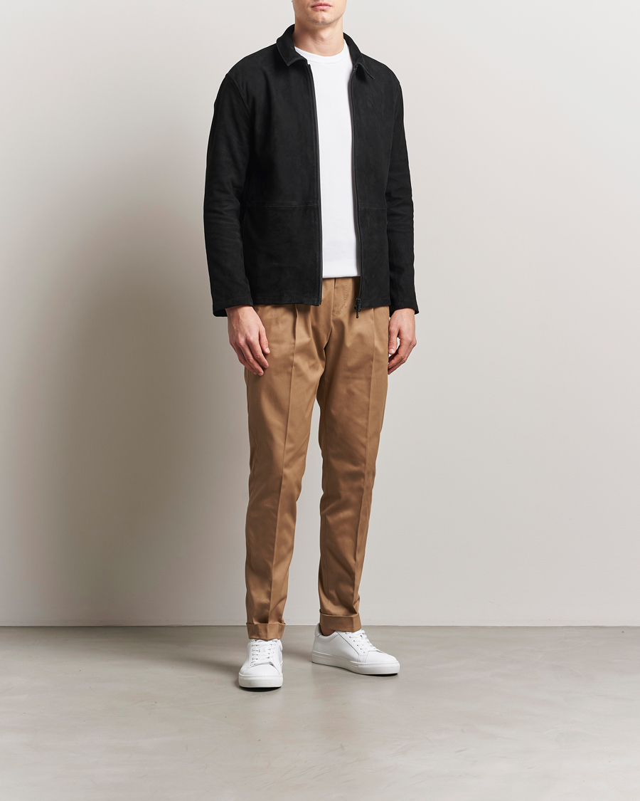 Homme | Pantalons | Tiger of Sweden | Tenuta Pleated Cotton Trousers Beige