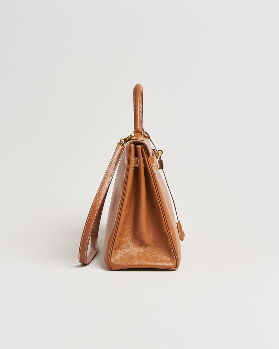Homme | Hermès Pre-Owned Kelly 35 Courchevel Handbag Gold | Hermès Pre-Owned | Kelly 35 Courchevel Handbag Gold