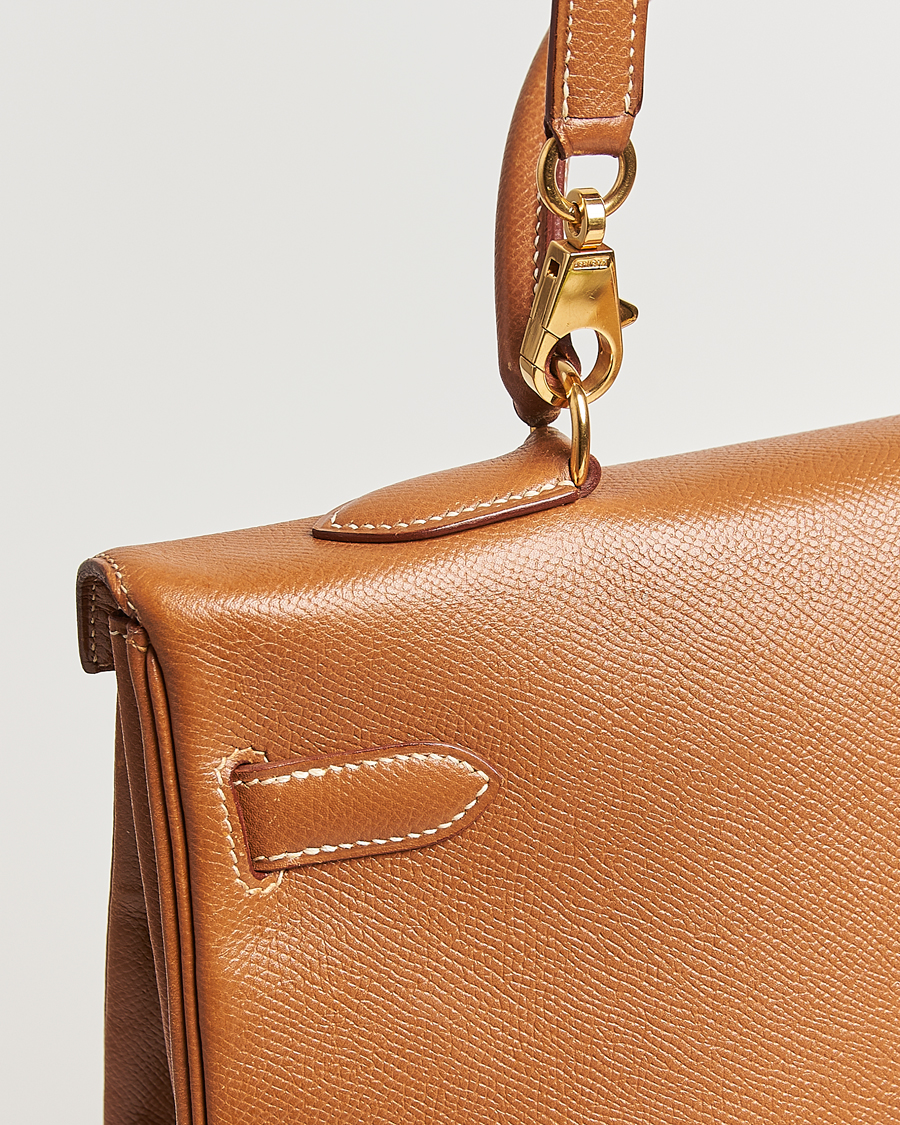 Homme | Hermès Pre-Owned Kelly 35 Courchevel Handbag Gold | Hermès Pre-Owned | Kelly 35 Courchevel Handbag Gold