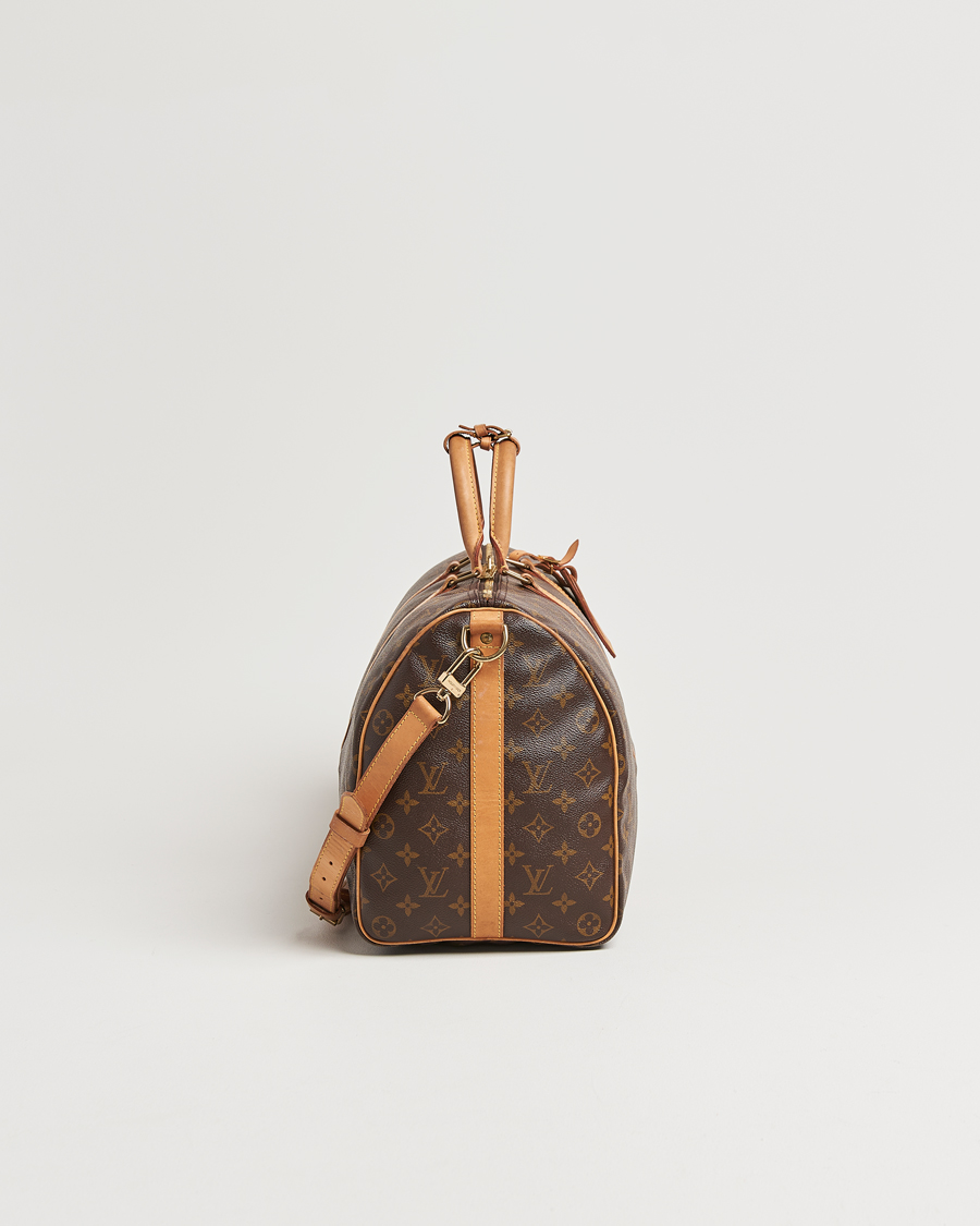 Homme | Louis Vuitton Pre-Owned Keepall Bandoulière 45 Monogram | Louis Vuitton Pre-Owned | Keepall Bandoulière 45 Monogram