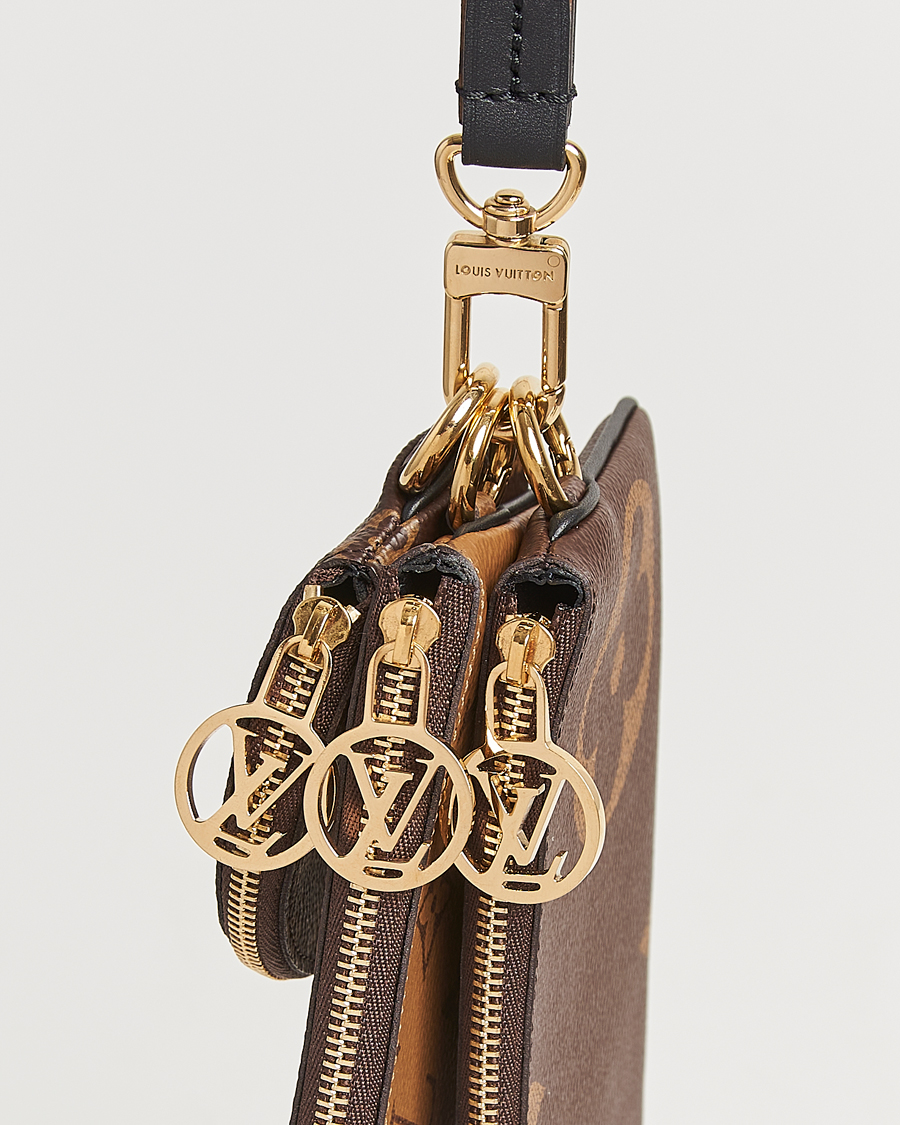 Homme | Louis Vuitton Pre-Owned Giant Trio Pouch Reverse Monogram | Louis Vuitton Pre-Owned | Giant Trio Pouch Reverse Monogram