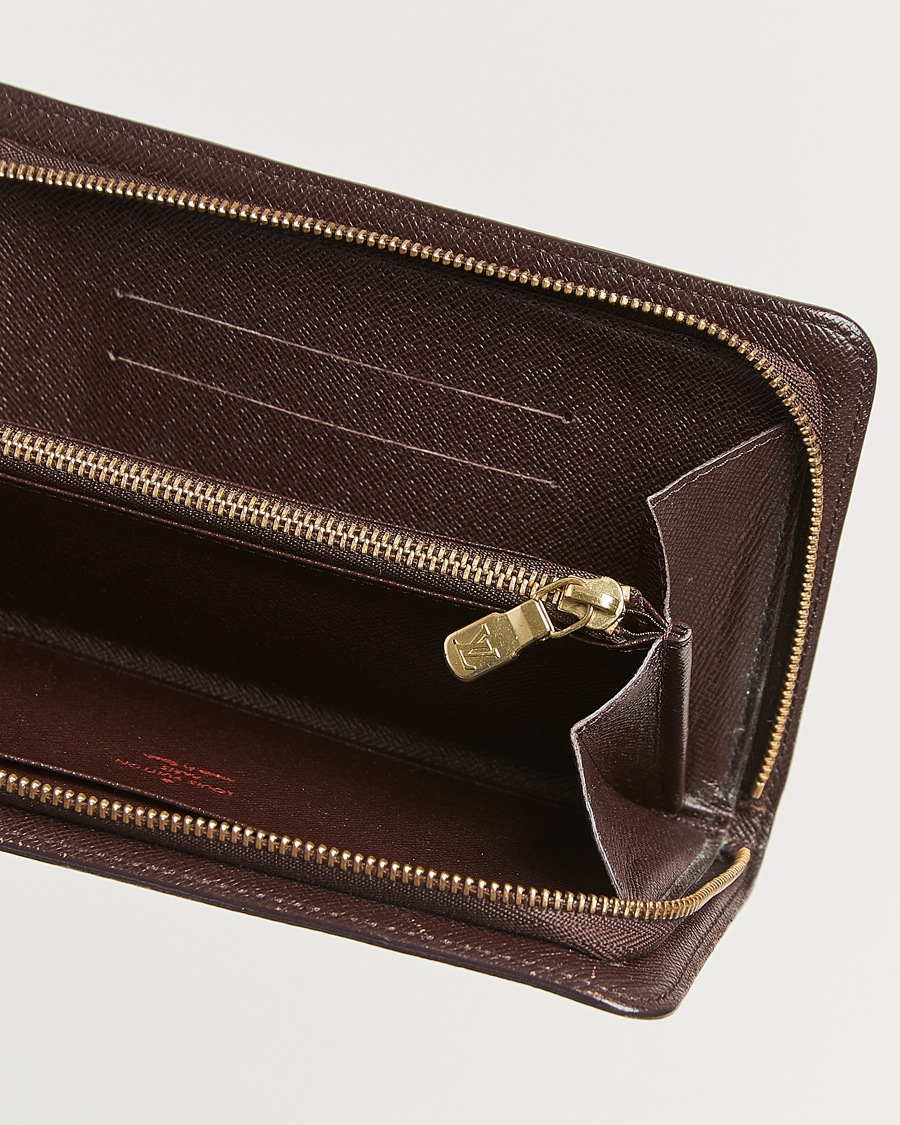 Heren | Louis Vuitton Pre-Owned Porte Monnaie Zippy Wallet Damier Ebene | Louis Vuitton Pre-Owned | Porte Monnaie Zippy Wallet Damier Ebene