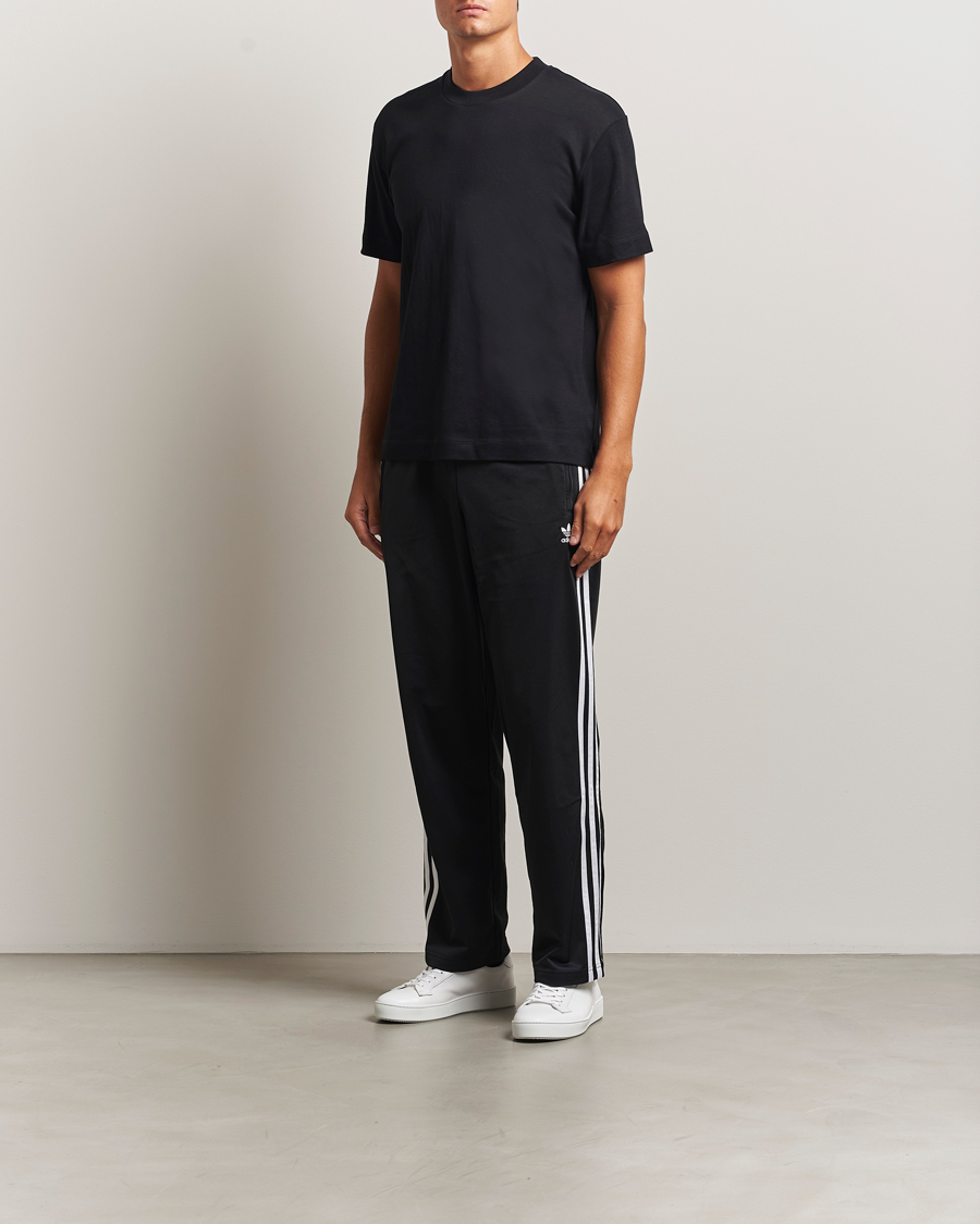 Homme | Pantalons | adidas Originals | Firebird Track Pants Black
