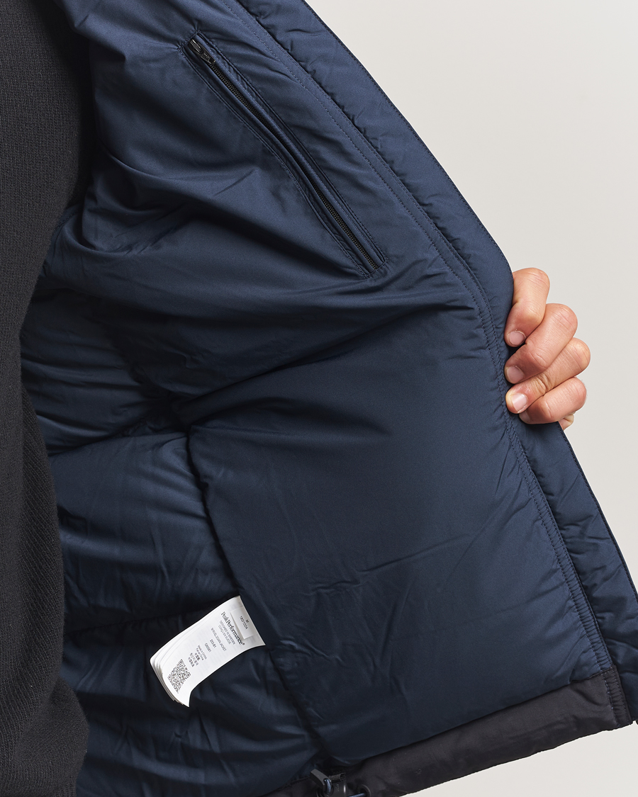 Heren | Jassen | Peak Performance | Rivel Down Hooded Jacket Blue Shadow