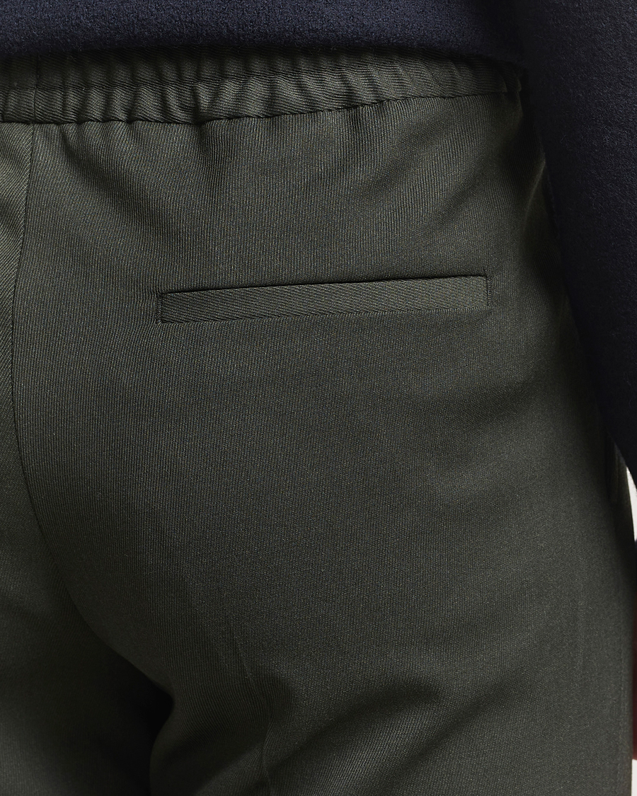 Homme | Pantalons | Filippa K | Theo Relaxed Wool Trousers Green Melange