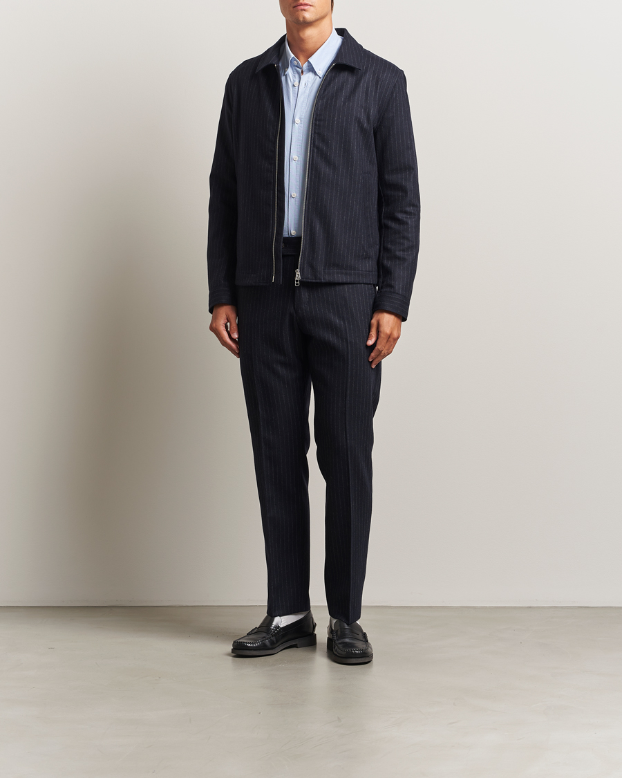 Homme | Pantalons | Tiger of Sweden | Tense Wool Pleated Pinstriped Trousers Blue Function