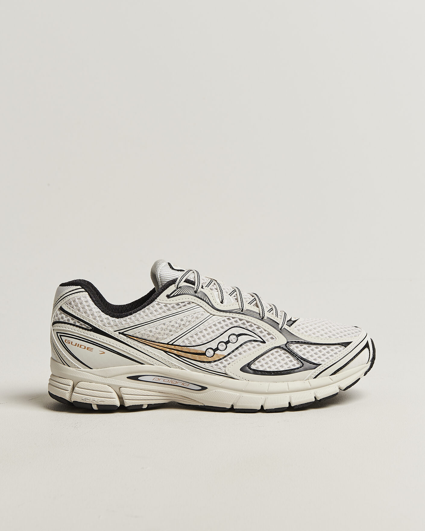 Heren | Sneakers | Saucony | Guide 7 Running Sneaker Onyx/Gold
