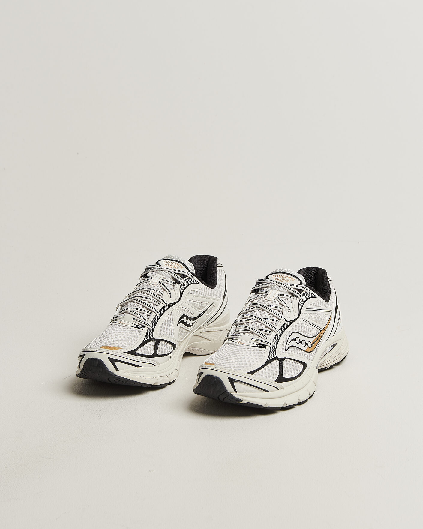 Homme | Baskets | Saucony | Guide 7 Running Sneaker Onyx/Gold