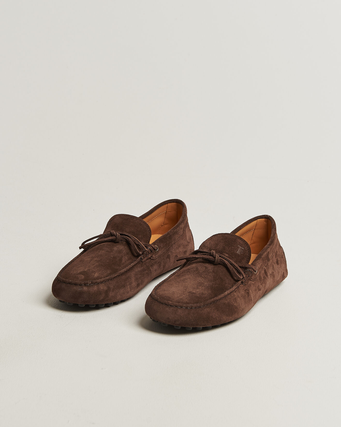 Heren | Mocassins | Tod's | Lacetto Gommino Carshoe Dark Brown Suede