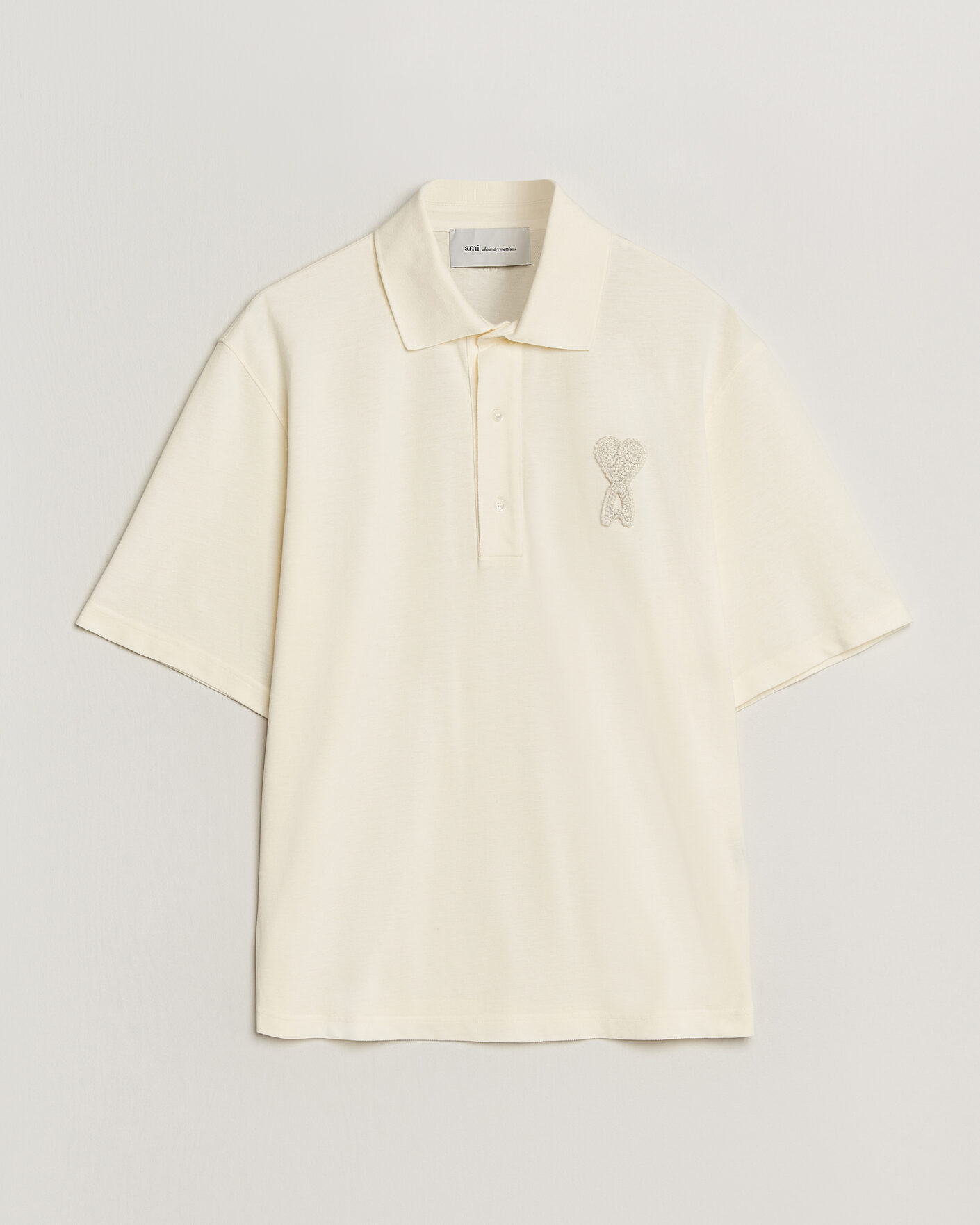 Heren | Polo's | AMI | Knitted Heart Logo Polo Creme