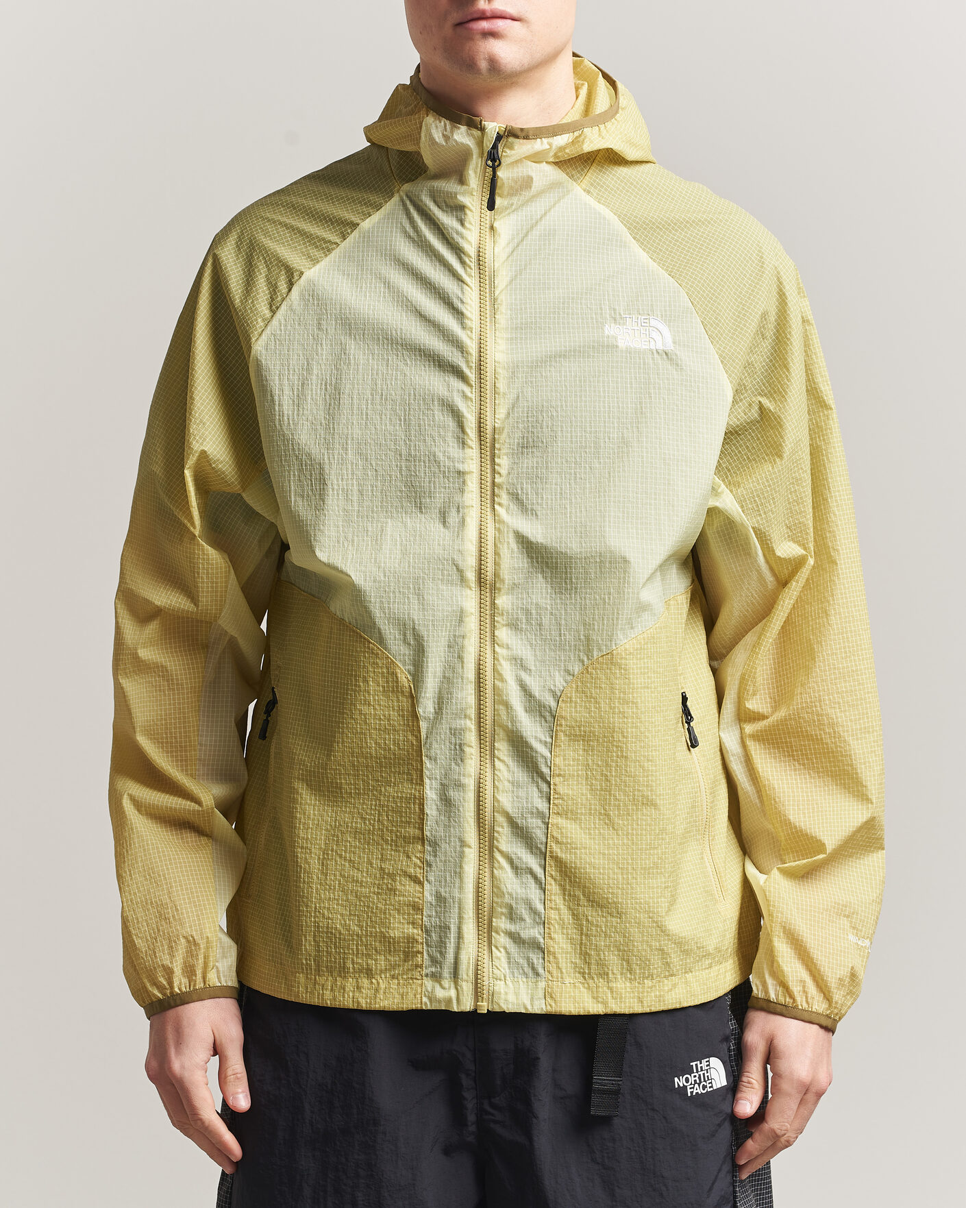 Heren | Jassen | The North Face | NSE Wind Jacket Lemon Mist