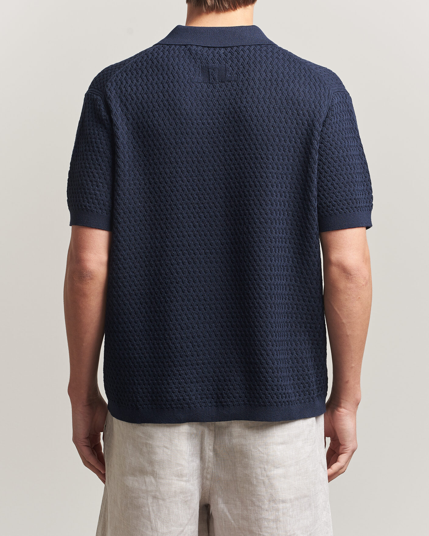 Homme | Polos | J.Lindeberg | Jacques Structured Knitted Polo Navy